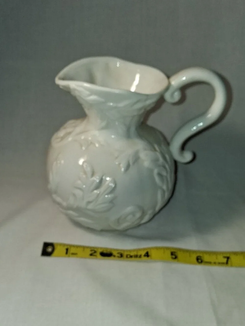 Vintage White Embossed Pitcher with Leaves/Vines Design Curved Handle